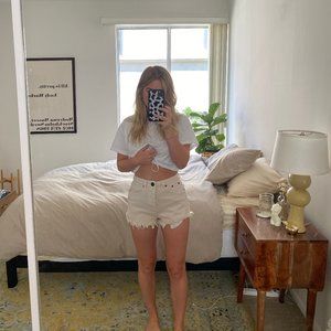 LIGHT PINK DENIM CUT OFFS